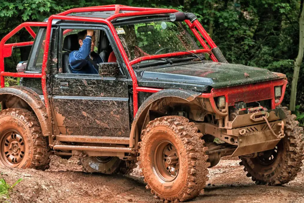 A man sitting inside an SXS vehicle