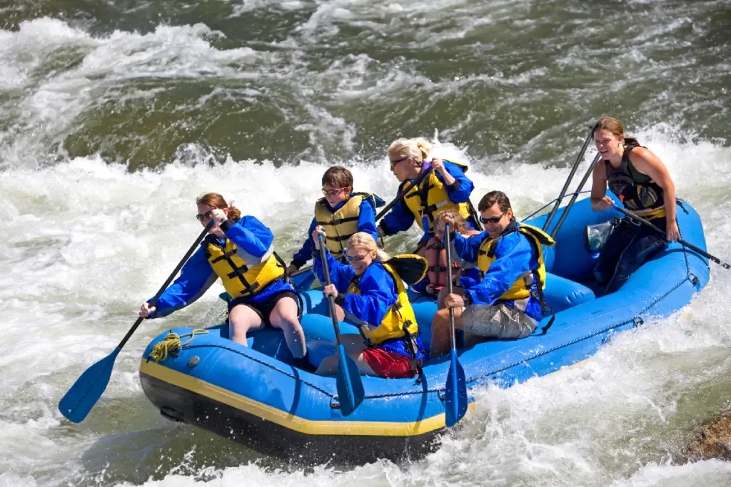 White water rafting on a fast-moving rapid